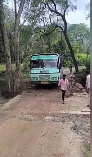 கடம்பூா் மலைப் பகுதியில் சீரமைக்கப்பட்ட  பாதை  வழியாக  இயக்கப்பட்ட  அரசுப்  பேருந்து.