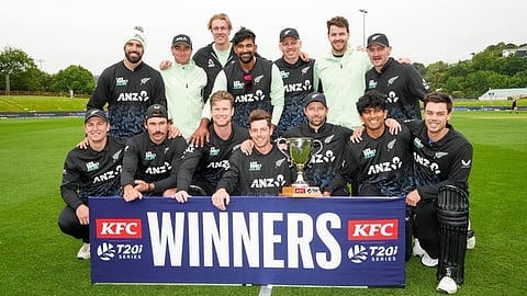 New Zealand players pose with the trophy after winning the T20 series