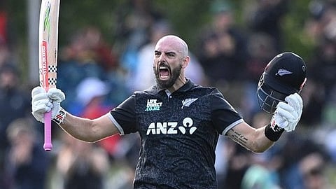 Daryl Mitchell expresses joy after scoring a century