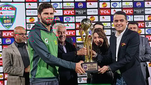 Pakistan's ODI team's skipper Shaheen Shah Afridi, second left, receives ODI series winning trophy at presentation ceremony on the end of the third one day international cricket match in Rawalpindi.