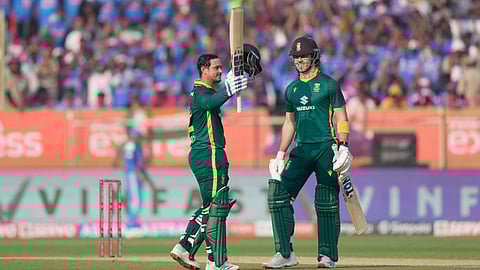 Quinton de Kock celebrates after scoring a century