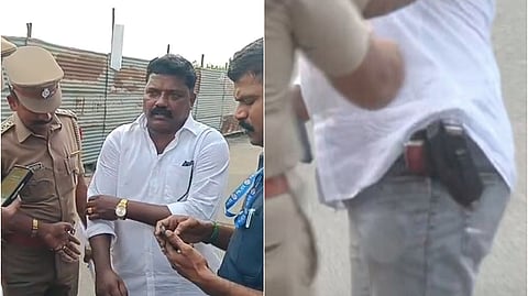 விஜய் பங்கேற்கும் கூட்டத்துக்கு துப்பாக்கியுடன் வந்தவரை காவல் துறையினர் அழைத்துச் சென்ற போது...