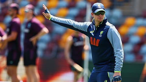 Australia's captain Steve Smith warms up before start the fourth day of the second Ashes cricket test match between Australia and England in Brisbane,