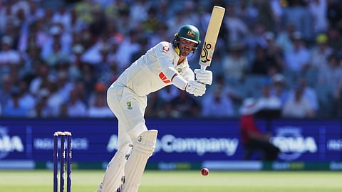 Australia's Mitchell Starc bats during play on day two of the third Ashes cricket test between England and Australia in Adelaide, Australia
