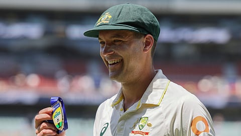 Australia's Alex Carey poses with man of the match award after Australia won the third Ashes Test against England in Adelaide, Australia.