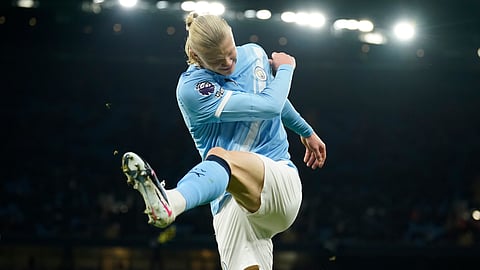 Manchester City's Erling Haaland reacts after missing a chance to score a goal during the English Premier League soccer match between Manchester City and West Ham United in Manchester