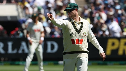 Australia's Steve Smith directs fielders on Day 2 of their Ashes cricket test match against England in Melbourne