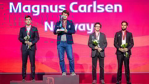 Carlsen with the World Blitz Cup.