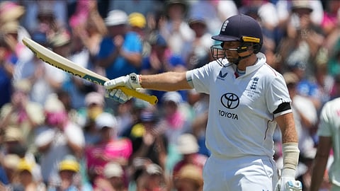 England's Joe Root gestures after scoring 50 runs during play on day one of the fifth and final Ashes cricket test between England and Australia in Sydney.