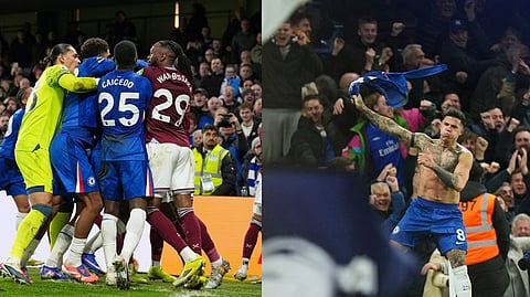 Chelsea's Enzo Fernandez celebrates, with teammate Marc Cucurella at right, after scoring his side's third goal during the English Premier League soccer match between Chelsea and West Ham United. 