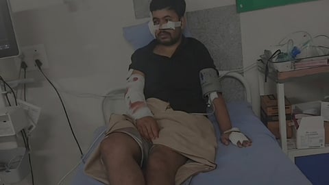 சிறுத்தை தாக்கியதில் காயமடைந்த டீக் பகதூா்.