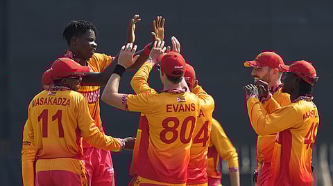 The Zimbabwe players were overjoyed after taking a wicket.