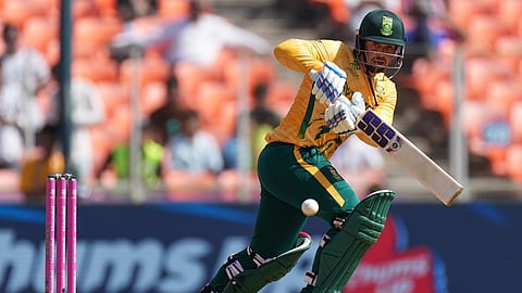 South Africa's Quinton de Kock takes a shot during the T20 World Cup cricket match between Afghanistan and South Africa in Ahmedabad, India, Wednesday, Feb. 11, 2026. (AP Photo/Ajit Solanki)