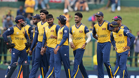 Sri Lanka's players celebrates the wicket of Oman's Nadeem Khan during the T20 World Cup cricket match between Oman and Sri Lanka in Pallekele, Sri Lanka, Thursday, Feb. 12, 2026. (AP Photo/Eranga Jayawardena)