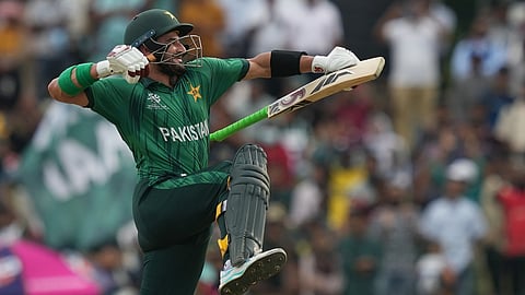 Pakistan's Sahibzada Farhan celebrates his century during the T20 World Cup cricket match between Namibia and Pakistan in Colombo, Sri Lanka, Wednesday, Feb. 18, 2026. (AP Photo/Eranga Jayawardena)