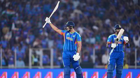 India's Shivam Dube, left, celebrates his fifty runs as batting partner Hardik Pandya applauds during the T20 World Cup cricket match between India and Netherlands in Ahmedabad, India, Wednesday, Feb. 18, 2026. (AP Photo/Ajit Solanki)
