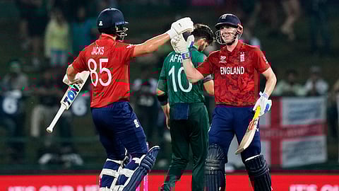 England's Will Jacks congratulates Harry Brook, right, after scoring his century during the T20 World Cup cricket match between England and Pakistan in Pallekele, Sri Lanka, Tuesday, Feb. 24, 2026. (AP Photo/Eranga Jayawardena)