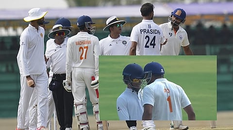 Hubballi: Field umpires intervene during an argument between Jammu and Kashmir's captain Paras Dogra and Karnataka's Prasidh Krishna during the second day of the Ranji Trophy 2025-26 final cricket match between Karnataka and Jammu and Kashmir at the KSCA Cricket Stadium, in Hubballi, Karnataka, Wednesday, Feb. 25, 2026. (PTI Photo/Shailendra Bhojak)