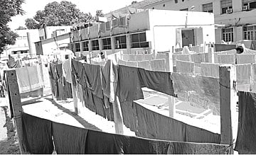 அறுவைச் சிகிச்சை துணிகளை துவைப்பதில் சிக்கல்: அரசு மருத்துவமனையில் தண்ணீர் பற்றாக்குறை