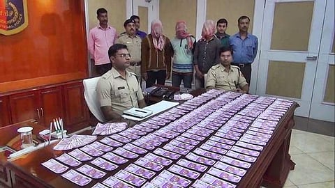 ரூ.6 லட்சம் மதிப்புள்ள ரூ.2,000 போலி நோட்டுகள் பறிமுதல்: 3 பேர் கைது