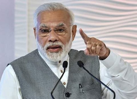 மதத்தின் பெயரால் மக்களை பிளவு படுத்த முயற்சிக்கிறது காங்கிரஸ்: பிரதமா் மோடி குற்றச்சாட்டு