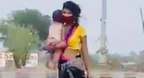 சூரத் - பிரயாக்ராஜ்: கைக்குழந்தையுடன் 1,200 கி.மீ. நடந்து வந்த புலம்பெயர் பெண் தொழிலாளி