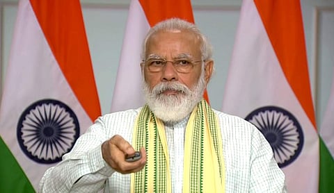 மத்திய பிரதேசத்தில் அமைக்கப்பட்டு உள்ள 750 மெகாவாட் சூரிய மின்திட்டத்தை பிரதமர் மோடி நாட்டுக்கு அர்ப்பணித்தார்.