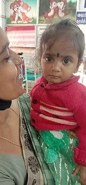 மீட்கப்பட்ட பெண் குழந்தை.