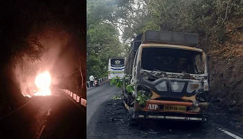 குமுளி மலைச்சாலையில் திடீரென தீ பிடித்து எரியும் ரப்பர் சுமை ஏற்றி வந்த லாரி.