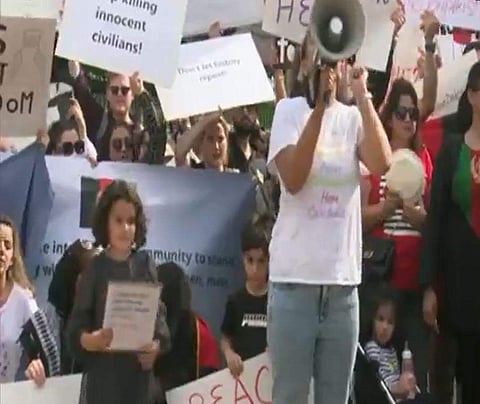 வெள்ளை மாளிகைக்கு வெளியே ஆப்கன் நாட்டினர் போராட்டம்