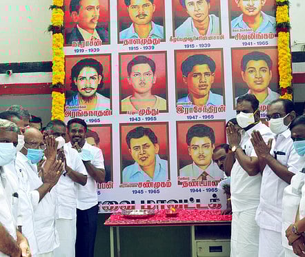 மொழிப்போா் தியாகிகளுக்கு திமுக, அதிமுகவினா் அஞ்சலி