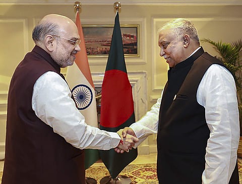 ஹிந்துக்கள் மீது தாக்குதல்: வங்கதேச அமைச்சருடன் விவாதித்தாா் அமித் ஷா