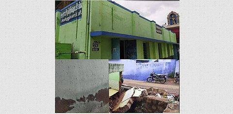 கனமழைக்கு இடிந்து சேதமடைந்த அயன் குறும்பலாப்பேரி ஊராட்சி ஒன்றிய தொடக்கப்பள்ளியின் சுற்றுச்சுவர்
