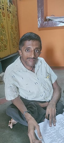 முருகவேல்.