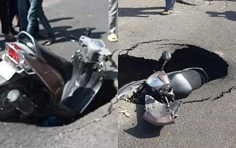 புதிய சாலையில் திடீர் பள்ளம்! சிக்கியது இருசக்கர வாகனம்