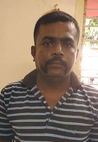 கைது செய்யப்பட்ட எம்.பி.யின் உதவியாளா் விஜய்ராமு.