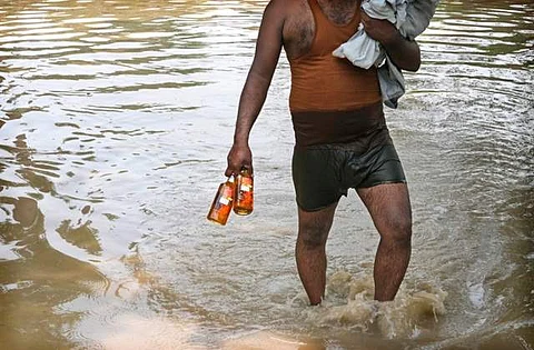 தில்லியில் வெள்ளமும் தண்ணியும்!