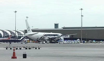 நடுவானில் நிலைகுலைந்த சிங்கப்பூா் விமானம்