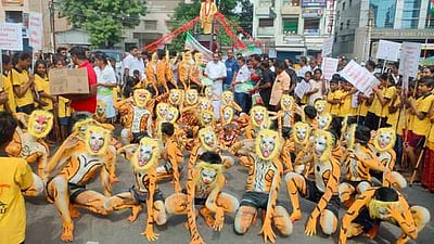 திருச்செங்கோட்டில் புலிகள் தின விழிப்புணா்வு பேரணி