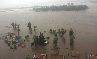 வட கொரியா: வெள்ளம் சூழ்ந்த பகுதிகளிலிருந்து 5,000 பேர் மீட்பு!