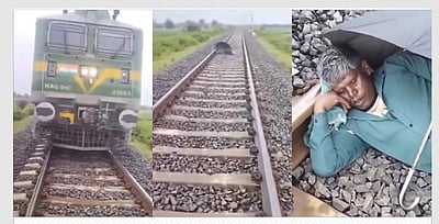 உ.பி.: ரயில் தண்டவாளத்தில் குடையுடன் படுத்து உறங்கிய நபர்