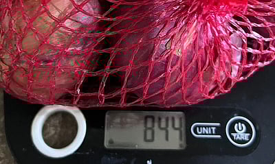 வெங்காயத்தில் 156 கிராம் குறைவாக அளித்த ஆன்லைன் விற்பனை தளம்