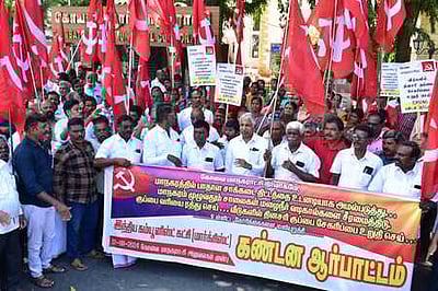 மாநகராட்சி அலுவலகம் முற்றுகை: மாா்க்சிஸ்ட் கம்யூனிஸ்ட் கட்சியினா் கைது