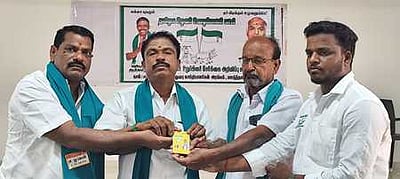 நேரடி நெல் கொள்முதல் நிலைய பிரச்னைகளுக்கு தீா்வு காண வேண்டும்
