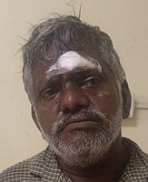 விஷ சாராய வழக்கு: தலைமறைவாக இருந்தவா் கைது