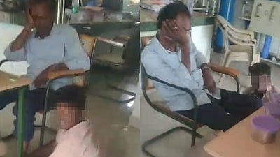 மாணவர்களை கால் அழுத்தச் சொல்லி ஓய்வெடுக்கும் ஆசிரியர்: வைரல் விடியோ!