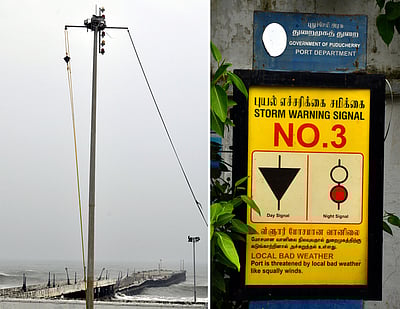 புதுச்சேரி பழைய துறைமுகத்தில் 3-ஆம் எண் புயல் எச்சரிக்கைக் கூண்டு ஏற்றம்