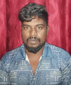 அரசுப் பேருந்தின் கண்ணாடியை உடைத்தவா் கைது