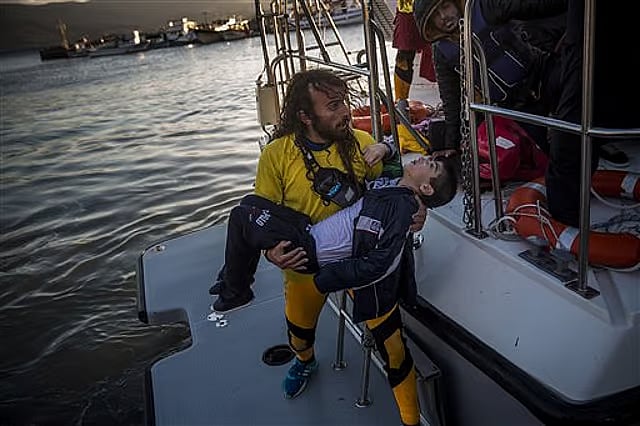 Refugee boat capsizes.