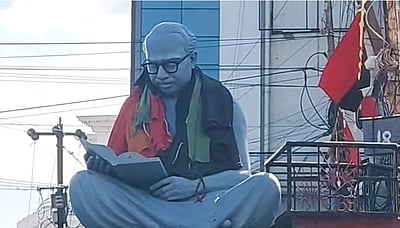 அண்ணா சிலை மீது திமுக-பாஜக கொடியை இணைத்து போடப்பட்டதால் பரபரப்பு